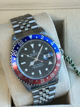 Rolex GMT-Master II 40mm Pepsi Bezel Stainless Steel Jubliee Men's Watch 16700