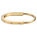 Tiffany & Co Lock Bangle in 18k Yellow Gold with Diamond Accents Small Bracelet