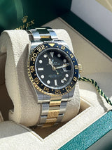 Rolex GMT-Master II Two-Tone Black Dial Ceramic Bezel 18K Gold Watch 116713LN