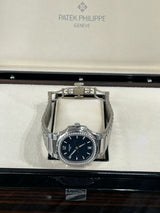 Patek Philippe Nautilus 35.2mm Blue Dial Diamond Bezel Ladies Watch 7118/1200A