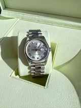 Rolex Day-Date 36mm Automatic Roman Silver Dial Platinum Jubilee Watch 18206
