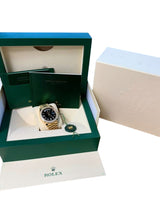 Rolex Day-Date 40 President Yellow Gold Diamond Bezel Baguette Black Dial 228348