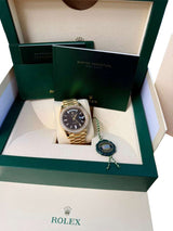 Rolex Day-Date 40 President Yellow Gold Diamond Bezel Baguette Black Dial 228348