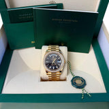 Rolex Day-Date 40 President Yellow Gold Diamond Bezel Baguette Black Dial 228348
