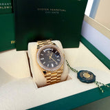 Rolex Day-Date 40 President Yellow Gold Diamond Bezel Baguette Black Dial 228348