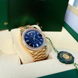 Rolex Day-Date 40 President Yellow Gold Diamond Bezel Baguette Black Dial 228348