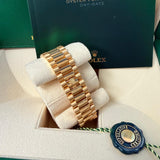 Rolex Day-Date 40 President Yellow Gold Diamond Bezel Baguette Black Dial 228348