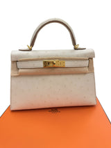 Hermès Kelly II Sellier Mini Beton Ostrich Leather With Gold Hardware Handbag