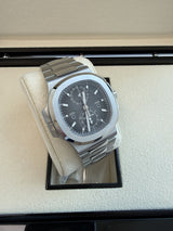 Patek Philippe Nautilus 40.5mm Travel Time Stainless Steel Watch 5990/1A-001