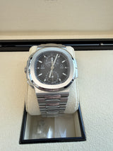 Patek Philippe Nautilus 40.5mm Travel Time Stainless Steel Watch 5990/1A-001