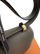 Top flap and edge detail of the Hermès Constance 24 Brown Epsom Leather Crossbody Shoulder Bag.