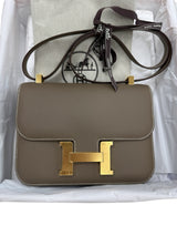 Hermès Constance 24 Brown Epsom Leather Crossbody Shoulder Bag shown with protective wrapping.