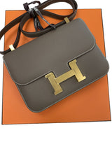 Three-quarter view of the Hermès Constance 24 Brown Epsom Leather Crossbody Shoulder Bag.