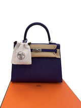 Hermès Kelly Sellier 25 purple Epsom leather handbag with palladium hardware, shoulder strap and padlock.