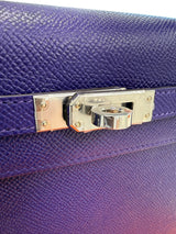 Hermès Kelly Sellier 25 purple Epsom leather texture and palladium-tone turn-lock clasp close-up.