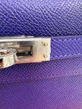 Hermès Kelly Sellier 25 purple Epsom leather texture and palladium-tone turn-lock clasp close-up.