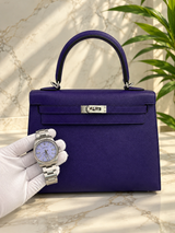 Interior view of Hermès Kelly Sellier 25 Purple Epsom Leather Palladium Hardware 2026 Handbag and watch